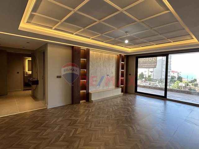 DOĞUMAK TOWER'DA ALANLI 'DA DENİZ MANZARALI 2+1 DAİRELER
