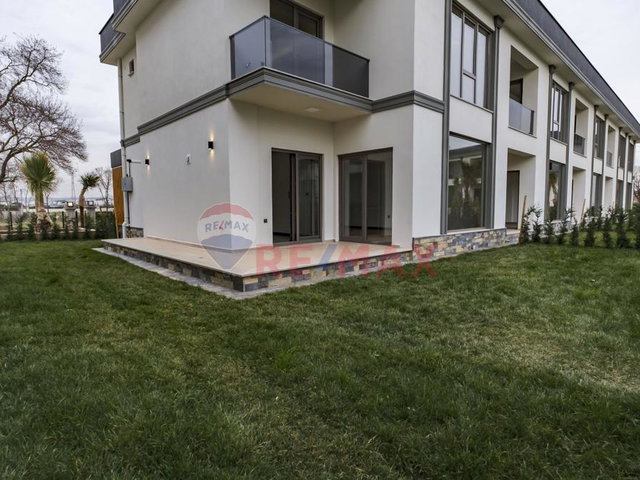 EMPIRE HOUSE SİTESİNDE GENİŞ BAHÇELİ VE MÜSTAKİL OTOPARKLI VİLLA