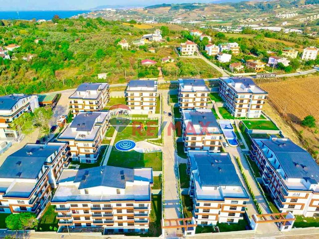 RE/MAX ŞEHİR 2'DE KORU'DASATILIK DENİZ MANZARALI 1+1 DAİRE