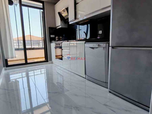 REMAX MAVİ'DEN KARASU'DA YERDEN ISITMA, CAM BALKONLU, KOMBİLİ, EBEVEYN BANYOLU