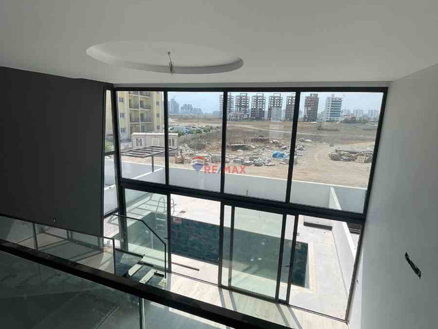 İSKELE TAM MERKEZİNDE 2+1 LOFT ÖZEL HAVUZLU DAİRE