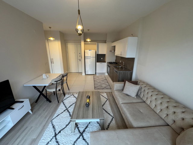 REMAX PROF SURYAPI İDİLİA 1+1 65 M2 FULL EŞYALI KİRALIK DAİRE