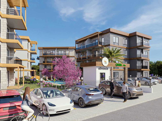 HAVUZLU, OTOPARKLI 4 BLOKLU SITEDE, PROJEDEN %50 PEŞINATLI DAIRE