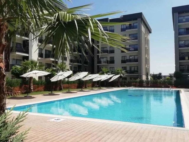 TORBALI YEDİEYLÜL MAH HAVUZLU SİTEDE KİRALIK EŞYALI 1+1 DAİRE