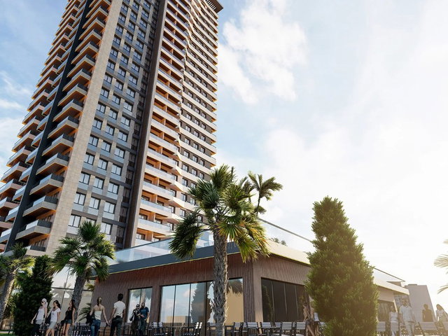 VELUX BAYRAKLI'DA DENIZ MANZARALI SATILIK 2+1 DAIRE