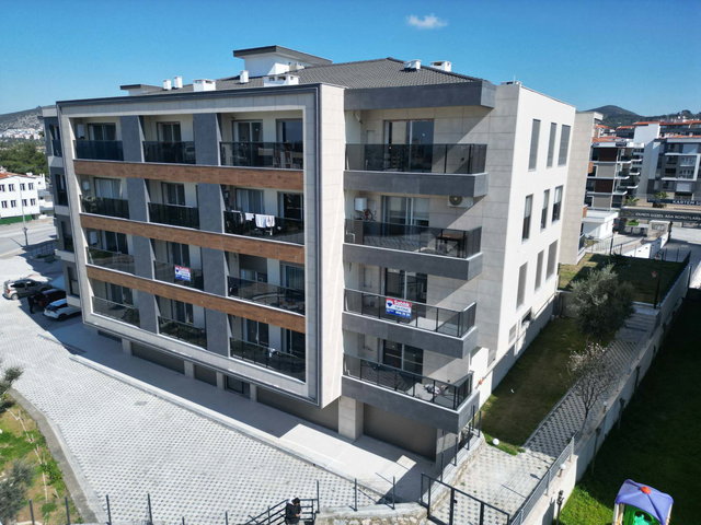 KUŞADASI'NDA YENI YAPILAN EKMEN GÜZELADA KONUTLARINDA 1+1 SATILIK ARA KAT DAIRE