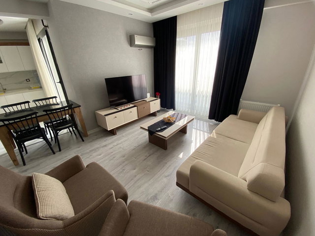 REMAX RİNA'DAN TECE MAH.DE FULL DENİZ MANZARALI EŞYALI 2+1 DAİRE
