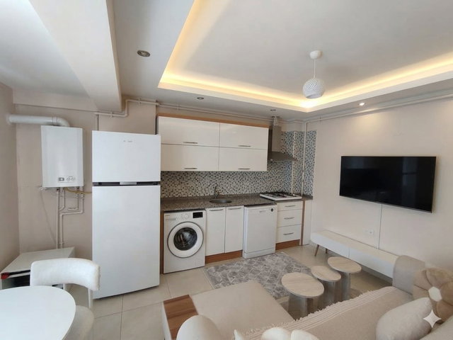 REMAX MODEL DEN FORUMA YÜRÜME MESAFİNDE 2+1 KİRACILI SATILIK APART
