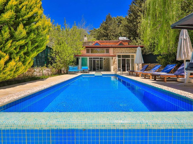 KAŞ SARIBELEN'DE (KALKAN) TURIZM BELGELI 2+1 SATILIK VILLA