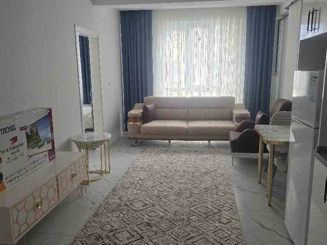 REMAX MODEL DEN AKKONAK MAHALLESINDE 1+1 SIFIR SATILIK APART