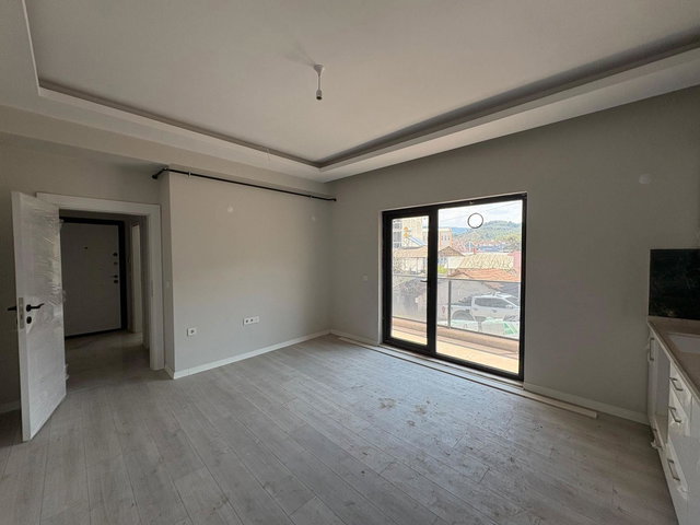 REMAX ADVANTAGEDE KURŞUNLUDA DENIZE YÜRÜME MESAFESINDE YATIRIMLIK DAIRE