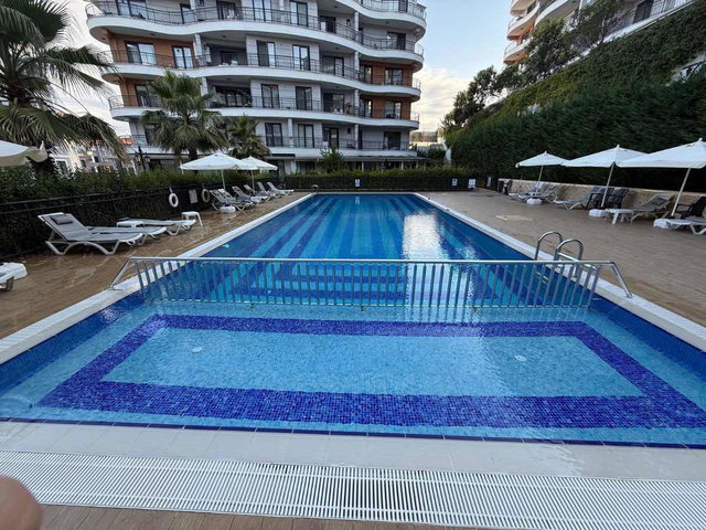 YEŞİLOVA VOGUE'DA ARA KAT HAVUZ CEPHELİ KİRALIK 2+1 DAİRE