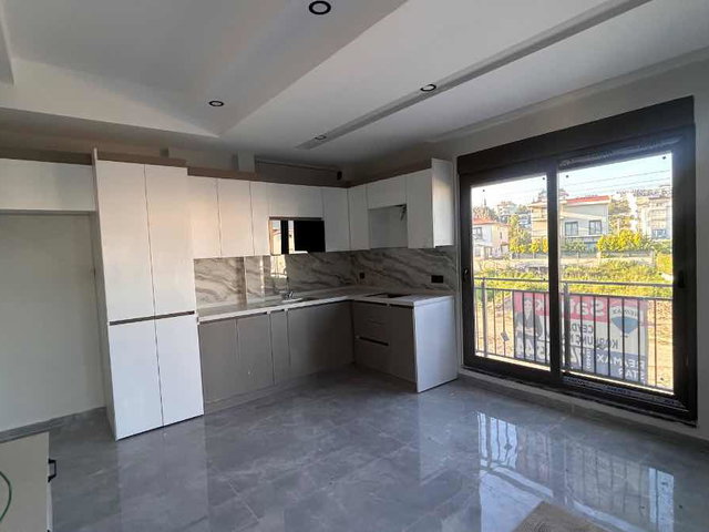 ILICA MAHALLESİNDE BULVAR ÜZERİNDE DÜKKAN ÜZERİ SATILIK 2+1 ASANSÖRLÜ DAİRE
