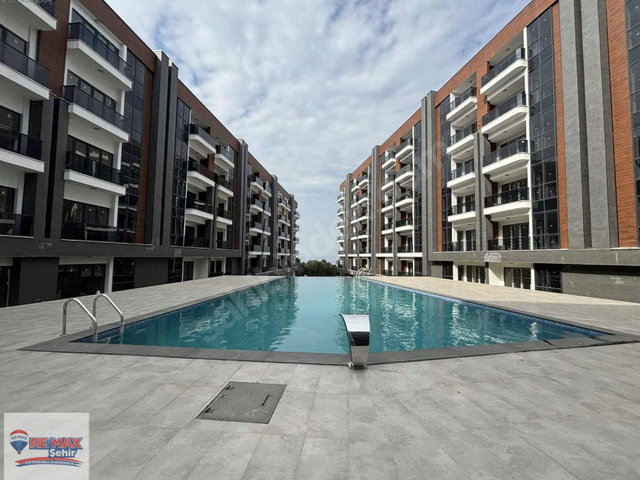 REMAX ŞEHİR ALKAŞ MEYDAN SUİTS FULL DENİZ MANZARALI SATILIK 1+1