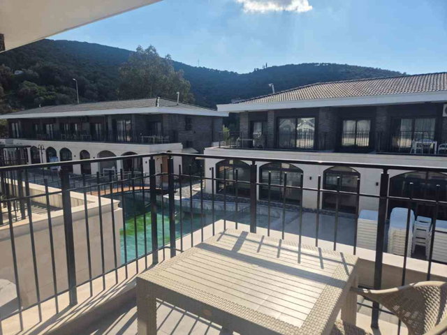 KUŞADASI KUŞTUR’DA ÖZTAŞ COUNTRY’DE 2+1 DAİRE HAVUZLU SİTEDE DENİZE YÜRÜME MESAFESİNDE
