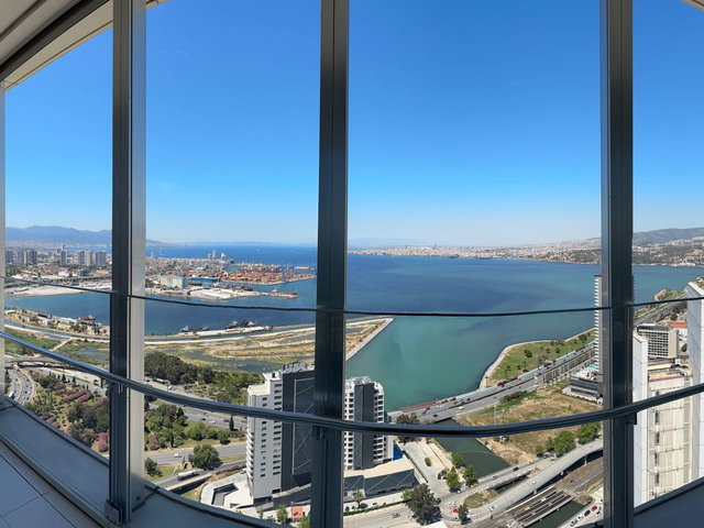 EGE PERLA'DA, PANORAMIK DENIZ MANZARALI 3+1 KIRALIK REZIDANS