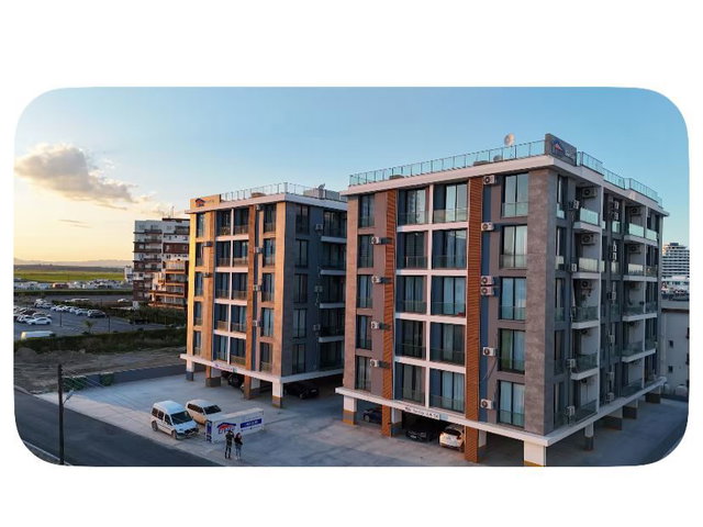 LONG BEACH`DE GRAND SAPPHIRE YANI DENIZE YÜRÜME MESAFELI KREDIYE UYGUN 2+1 SIFIR DAIRE
