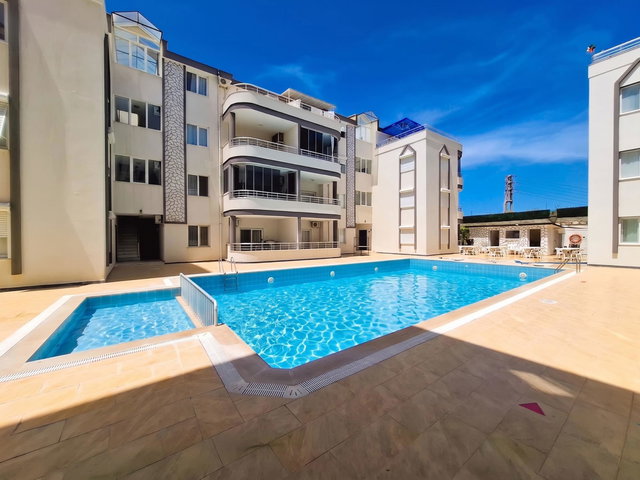 HAVUZLU SITE IÇERISINDE DOĞA MANZARALI GENIŞ BALKONLU 2+1 SATILIK DAIRE