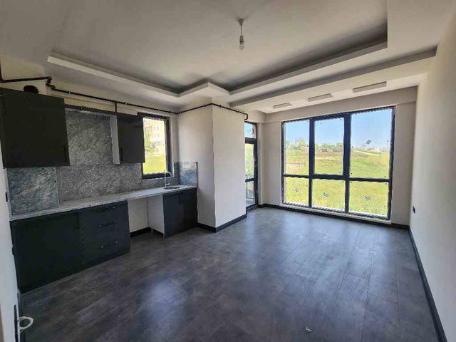 HEM OFİS HEM YAŞAM ALANI! PRESTİJLİ KONUMDA 1+1 DAİRE