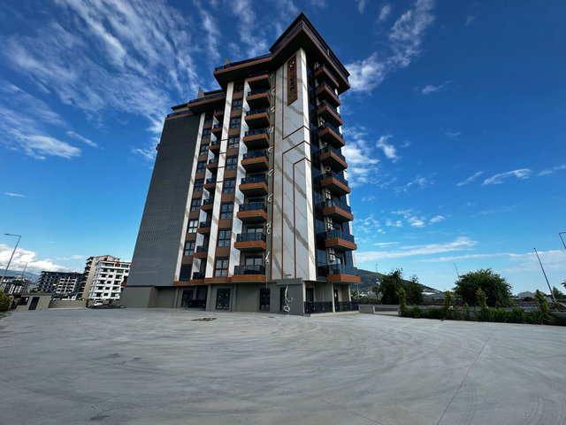 BOTANİK SİTESİ'NDE DENİZ, HAVUZ VE TROPİK PARK MANZARALI SATILIK 1+1 DAİRE