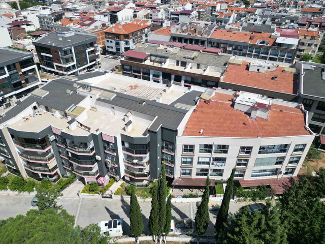KUŞADASI DAVUTLAR'DA MERKEZDE YENİ BİNADA 2+1 DAİRE
