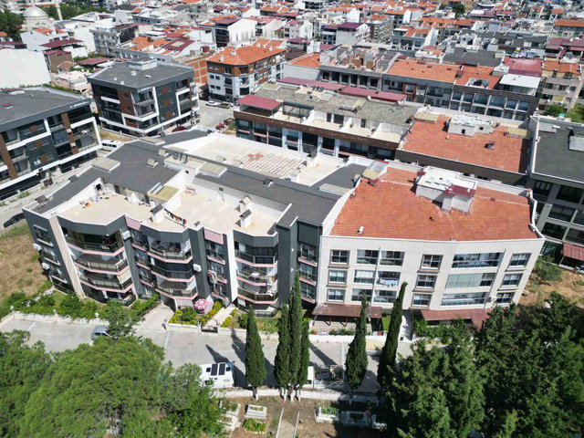 KUŞADASI DAVUTLAR'DA MERKEZDE YENİ BİNADA 2+1 DAİRE