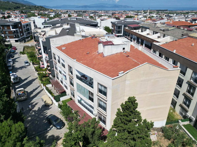 KUŞADASI DAVUTLAR'DA MERKEZDE YENİ BİNADA 2+1 DAİRE