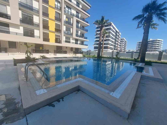 HAVUZLU ,HAVAALANINA YAKIN 1+1 KİRALIK DAİRE