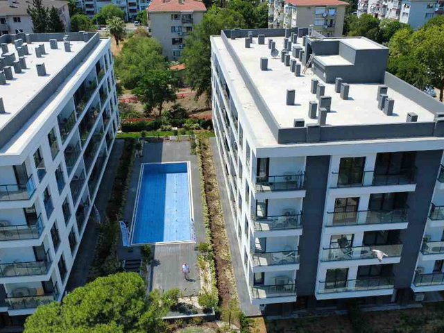BOSTANLI 1+1  KIRALIK SIFIR DAIRE SITE IÇI TRADEMARK SENSE