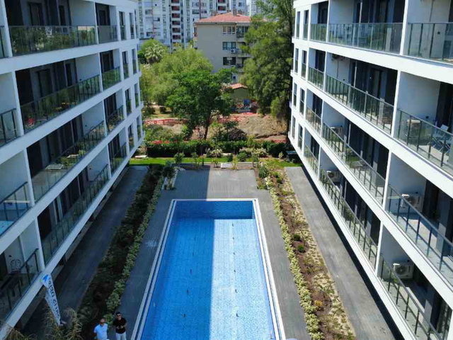 BOSTANLI 1+1  KIRALIK SIFIR DAIRE SITE IÇI TRADEMARK SENSE