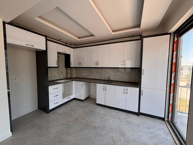 REMAX MODEL DEN GÜMÜŞÇAY MAHALLESINDE PARK CEPHELI 2+1 SIFIR SATILIK DAIRELER