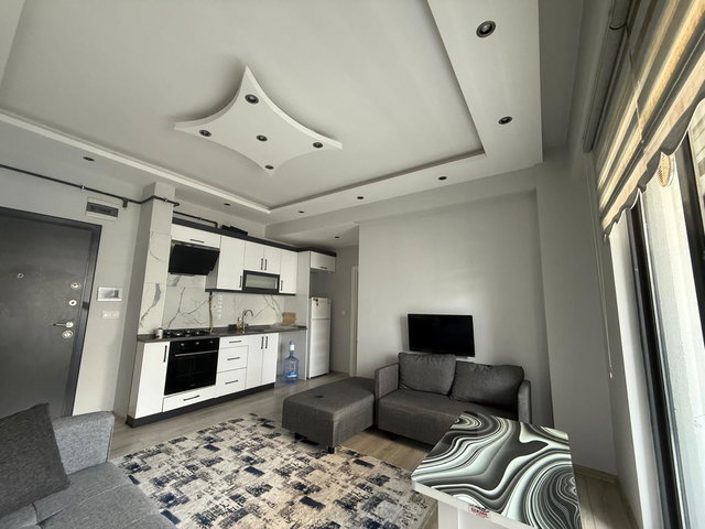 RE/MAX İNCİ DEN GOP ADLİYE ARKASI  EŞYALI KİRALIK 1+1 DAİRE