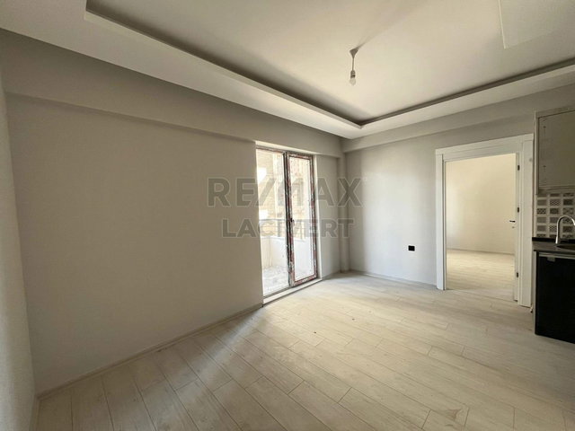 RE/MAX LACİVERT'TEN KOMBINA'DA SATILIK 1+1 SIFIR DAİRE