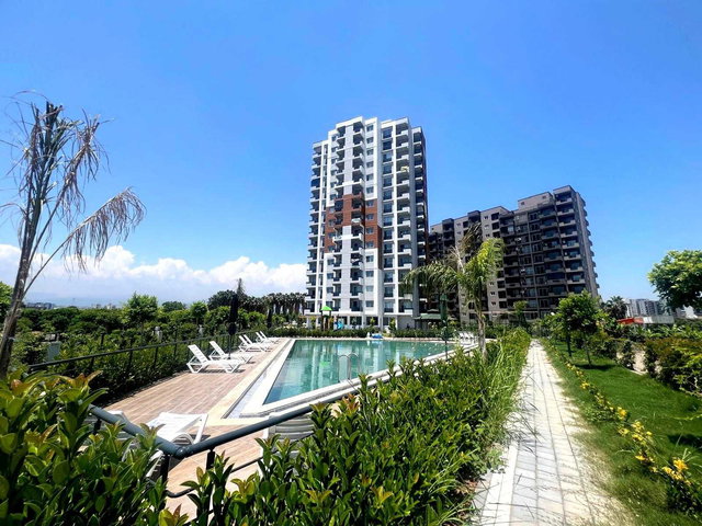 REMAX TOROS'TAN ÇEŞMELİ'DE DENİZ MANZARALI SATILIK 2+1