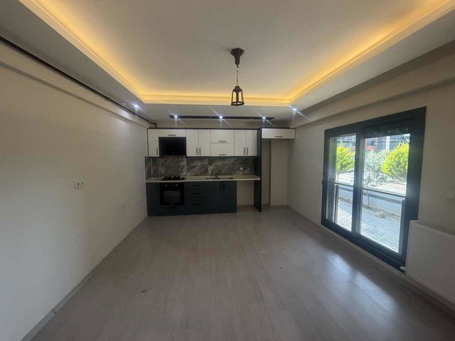 TORBALI MAH MERKEZİ KONUMDA SATILIK 1+1 GENİŞ DAİRE
