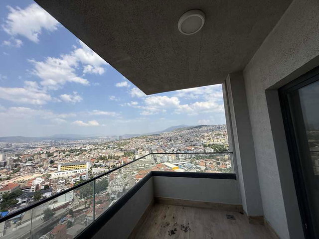 İZKA MERKEZ YAŞAM KONAK’TA DENİZ MANZARALI SATILIK  2 + 1 DAİRE