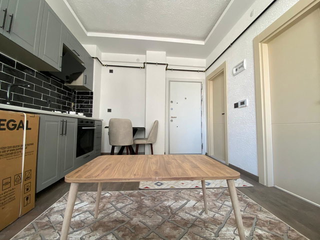 REMAX İLKE'DEN DADAŞKENTTE 1+1 EŞYALI KİRACILI SATILIK DAİRE