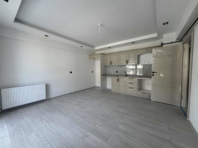 REMAX DOĞUDAN DOĞUKENTTE 1+1 SATILIK DAİRE