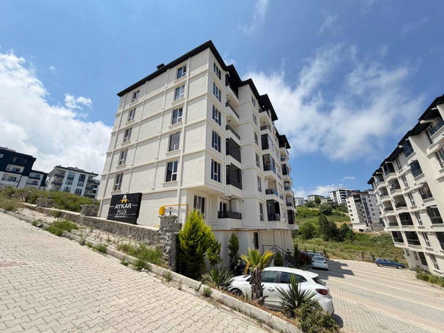 KÖRFEZDE SİTE İÇERİSİNDE DENİZ MANZARALI KİRALIK 1+1