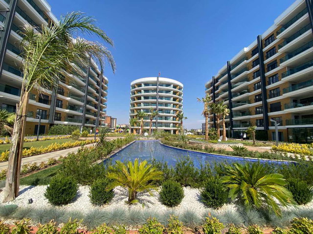 REMAX PİN'DEN LOTUS COUNTRY'DE BAHÇE KATI GENİŞ 2+1 MÜKEMMEL KONUMDA DAİRE