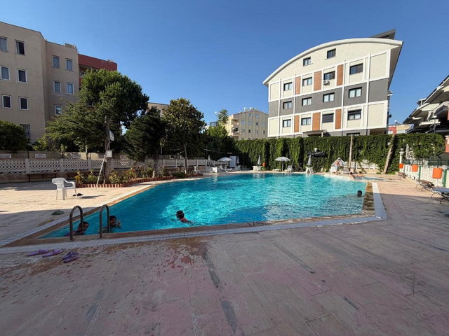 DİDİM’DE  HAVUZLU EŞYALI 3+1  SATILIK DAİRE