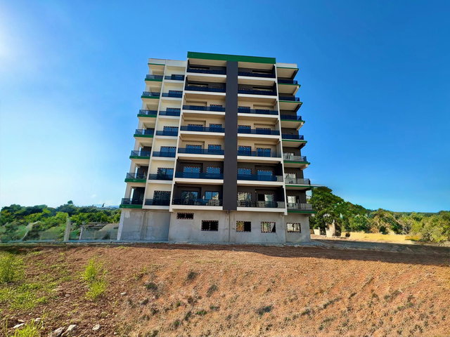 REMAX RİNA'DAN DAVULTEPE'DE GENİŞ OTURUMLU SIFIR 1+1