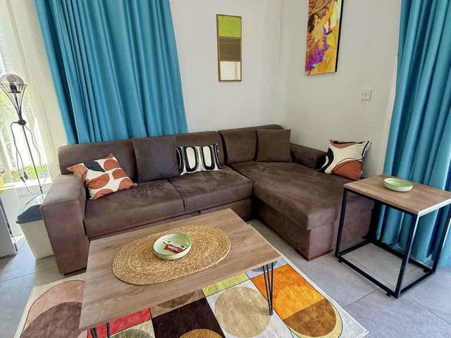 TURTLE BAY-OLİVE GROVE SATILIK 1+1 YENİ BAHÇE KAT DAİRE