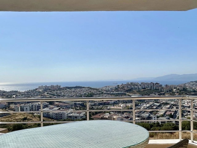 KUŞADASI DEĞİRMENDERE MAHALLESİ'NDE PANORAMİK DENİZ MANZARALI EŞYALI 3+1 DAİRE