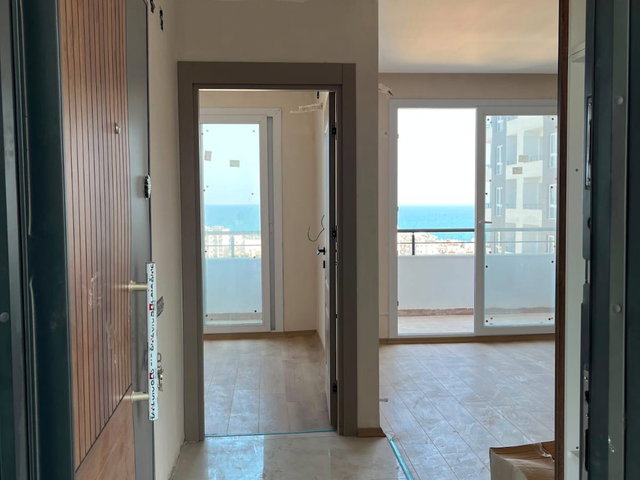 KOCAHASANLI’DA SIFIR SİTE İÇİ 11. KAT DENİZ MANZARALI 1+1 BALKONLU DAİRE
