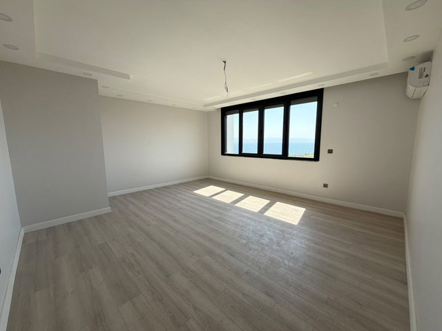PRESTIJLI SITE MANOLYA EVLERI'NDE DENIZ MANZARALI 3+1 DUBLEKS