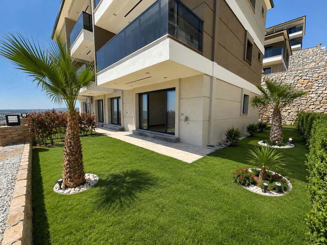 PANORAMİK DENİZ MANZARALI 2+1 BAHÇE KATI SIFIR DAİRE