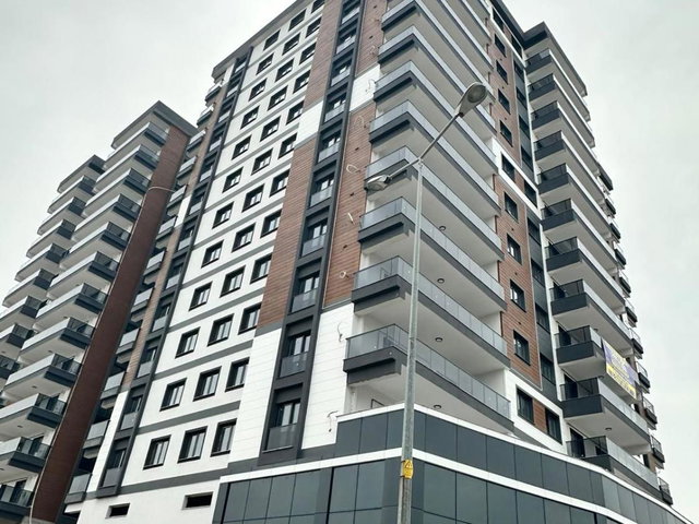 185 MENEMEN UĞUR MUMCU MERKEZI KONUMDA KAPALI OTOPARKLI, GENIŞ 2+1 KIRALIK DAIRE
