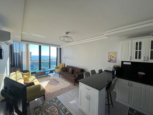 REMAX PALM'DEN ARPAÇBAHŞİŞ'TE DENİZ MANZARALI 1+1 EŞYALI KİRALIK