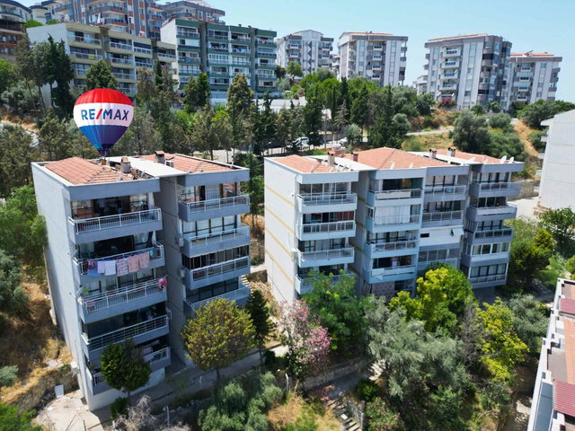 KUŞADASI İKİÇEŞMELİK’TE DENİZ MANZARALI 2+1 KAT MÜLKİYETLİ BALKONLU KREDİYE UYGUN SATILIK DAİRE